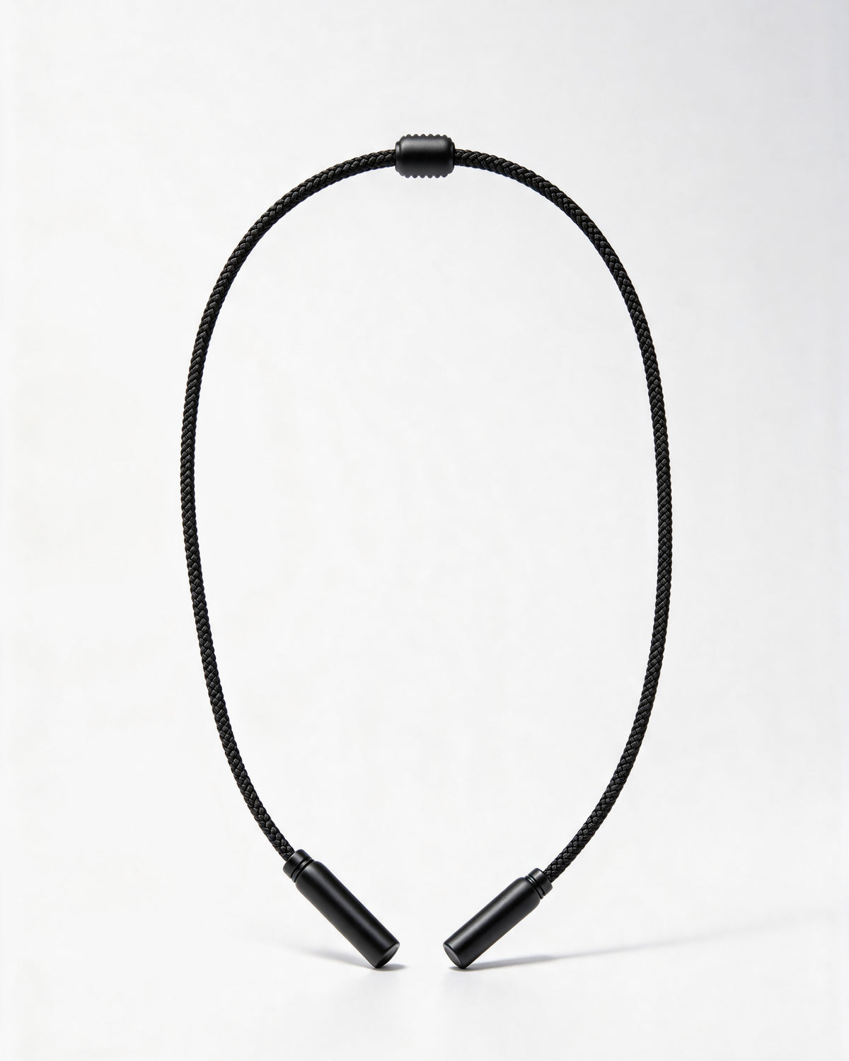 Black braided sport retainer strap with its slider and rubber end sleeves