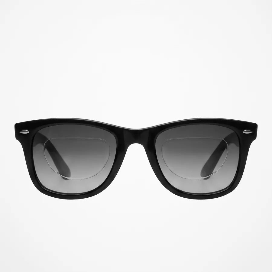 Flat or mildly curved sunglasses from the front, the patch a faint outline at most